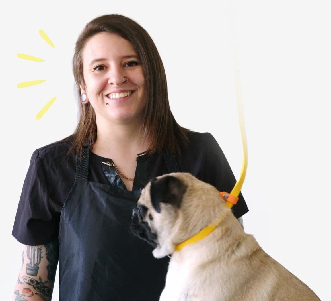 Nadia Bongelli smiling with a dog