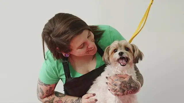 Instructor Nadia with a goldendoodle